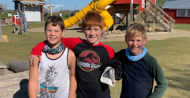 Three students smile during a Field Trip with NorthStar Academy Online School