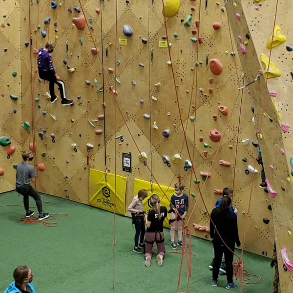 students at a rock climbing learning cluster with NorthStar Academy Online School